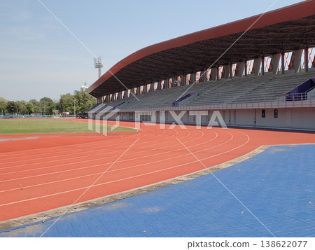 A view of the athletics track and sports facilities along the stands. A view of the athletics track and sports facilities along the stands. 138622077