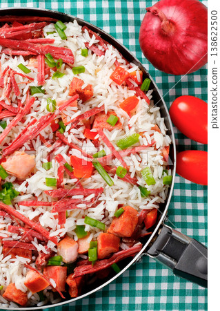 Arroz de Carreteiro, Carter's Rice, in the pan, a typical dish of Southern Brazilian cuisine with rice and dried meat Arroz de Carreteiro, Carter's Rice, in the pan, a typical dish of Southern Brazilian cuisine with rice and dried meat 138622500