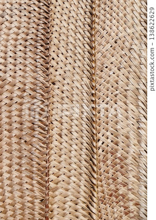 woven mats of dried coconut leaves  138622629