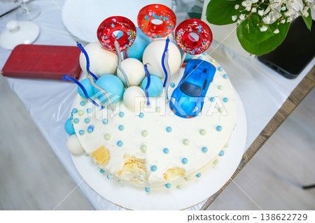 Cake for a boy with cars and sweets Cake for a boy with cars and sweets 138622729
