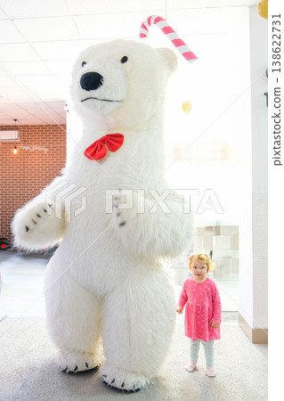 Little Girl and Huge Life-Size Bear Doll Little Girl and Huge Life-Size Bear Doll 138622731