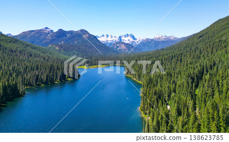 Landscape of mountain and forest of Cooper lake. Nature landscape. Cooper Lake in Washington. Scenic nature of popular hiking Cooper lake. Cooper lake with mountain landscape. Majestic mountains 138623785