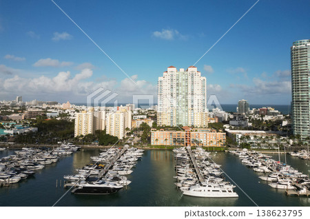 Docked yacht in port of Miami. Marina luxury cityscape. Port with yacht. Yachting marina. Luxury yacht charter. Miami port marina. Luxury yachting in summer. Charming marina 138623795