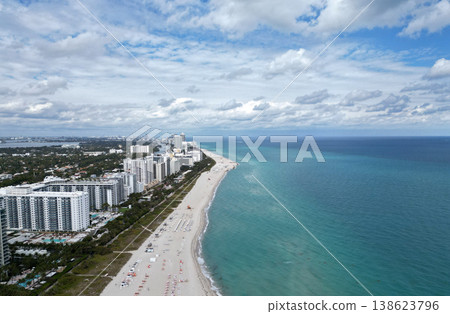Coastline of Miami. Miami south beach aerial view. Sea beach seashore and coastline. Summer vacation in Miami, Florida. Sea vacation on beach. Aerial marina view. Turquoise waters 138623796