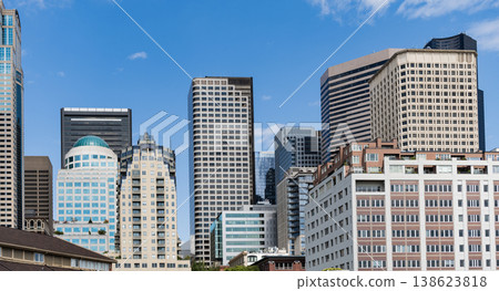 Skyscraper in city downtown. City skyline architecture. Office building in business district. Residential building. Skyscraper building architecture. Skyscraper cityscape skyline. Urban cityscape Skyscraper in city downtown. City skyline architecture. Office building in business district. Residential building. Skyscraper building architecture. Skyscraper cityscape skyline. Urban cityscape 138623818