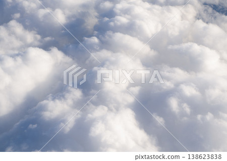Cloud and cloudscape aerial sky. Aerial cloudscape view covered with cloud. Aerial cloudy sky view. Cloud view from plane. Sky in cloud. Cloudscape with cloudy weather. Nebulosity background Cloud and cloudscape aerial sky. Aerial cloudscape view covered with cloud. Aerial cloudy sky view. Cloud view from plane. Sky in cloud. Cloudscape with cloudy weather. Nebulosity background 138623838