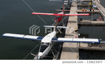 Vancouver, Canada - May 29, 2019: Plane waterfront station. Cessna 206 seaplane. Cessna 206 plane in seaplane terminal. Vancouver harbor airport. Seaplane tour. Retro planes in harbor Vancouver, Canada - May 29, 2019: Plane waterfront station. Cessna 206 seaplane. Cessna 206 plane in seaplane terminal. Vancouver harbor airport. Seaplane tour. Retro planes in harbor 138623857