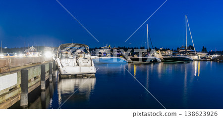 Luxury marina with private yacht boat. Docked yacht boat in harbor. Marina night. Luxury summer vacation in Miami. Private boat at night. Marina with luxury sea boat. Yacht club and marina in Miami Luxury marina with private yacht boat. Docked yacht boat in harbor. Marina night. Luxury summer vacation in Miami. Private boat at night. Marina with luxury sea boat. Yacht club and marina in Miami 138623926