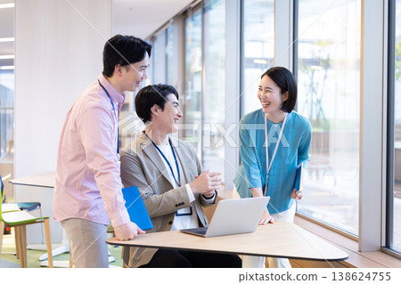 Business - Business people in a meeting. Filming cooperation: Denpa Gakuen Educational Foundation, Tokyo Electronics College. Business - Business people in a meeting. Filming cooperation: Denpa Gakuen Educational Foundation, Tokyo Electronics College. 138624755