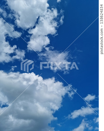 bright cumulus cloud and blue sky 138624834