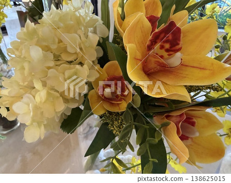 Artificial flower arrangement of hydrangeas and cymbidiums Artificial flower arrangement of hydrangeas and cymbidiums 138625015