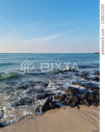 This is Gwakji Beach in Jeju Island, which has basalt rocks. This is Gwakji Beach in Jeju Island, which has basalt rocks. 138625208