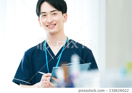 Young male healthcare worker Young male healthcare worker 138626022