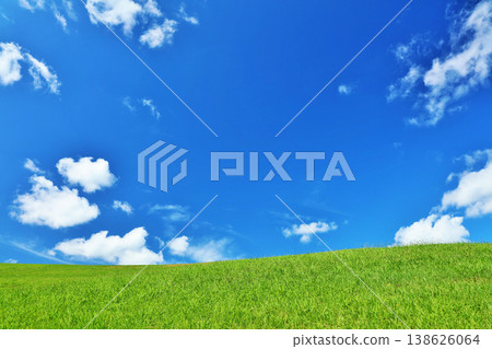 Refreshing summer blue sky and fresh green meadow landscape Refreshing summer blue sky and fresh green meadow landscape 138626064