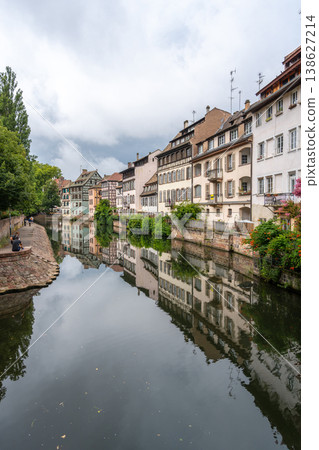 Canal with colorful houses and reflections in Strasbourg France 138627214