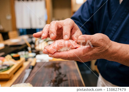 A craftsman who makes tuna sushi A craftsman who makes tuna sushi 138627479