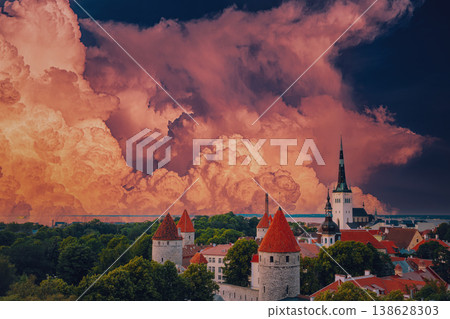 St. Olaf's Church spire and defensive walls under dramatic clouds 138628303