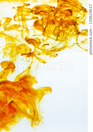 Iodine antiseptic drop dispersing in water, creating abstract patterns. Healthcare, disinfection, and medical treatment concept. Iodine antiseptic drop dispersing in water, creating abstract patterns. Healthcare, disinfection, and medical treatment concept. 138628617