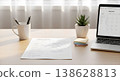 Workspace desk with January calendar planner and modern laptop in bright sunlight 138628813