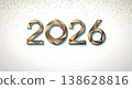 Year 2026 in luxurious golden geometric font with confetti on a white background, elegant design 138628816