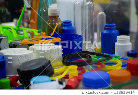 Different plastic products. Products made of multi-colored plastic. Models set of various products made of plastic. Multicolored objects. Models mounting boxes Different plastic products. Products made of multi-colored plastic. Models set of various products made of plastic. Multicolored objects. Models mounting boxes 138629414