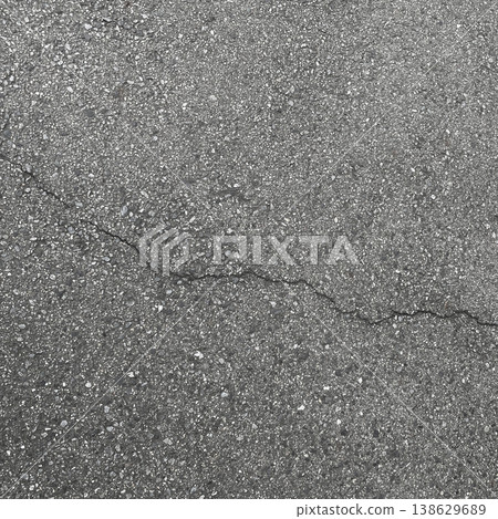 Square background image of gray asphalt with diagonal cracks 1 Square background image of gray asphalt with diagonal cracks 1 138629689