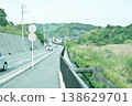Cars driving on a mountain road 138629701