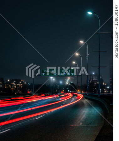 Cars driving on an elevated highway at night in Vancouver, Canada 138630147
