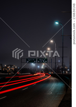 Cars driving on an elevated highway at night in Vancouver, Canada 138630148