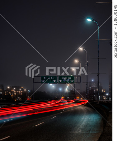 Cars driving on an elevated highway at night in Vancouver, Canada 138630149