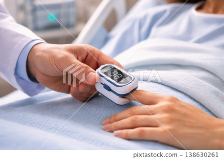Patient monitoring oxygen saturation with pulse oximeter in hospital Patient monitoring oxygen saturation with pulse oximeter in hospital 138630261