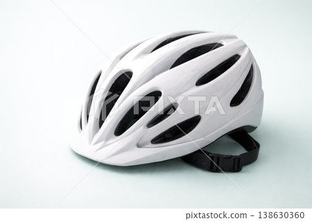 White modern bicycle helmet isolated on clean background for safety concept White modern bicycle helmet isolated on clean background for safety concept 138630360