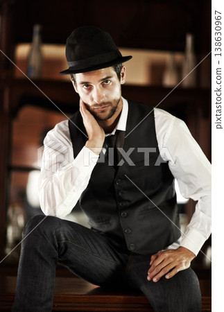 Gentleman, portrait or trendy fashion in pub to relax on break with cool style or elegant outfit in Italy. Barman, retro person or confident model in a hat or classy clothes for a vintage aesthetic 138630967