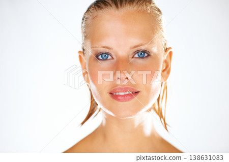 Shower, beauty and portrait of woman on a white background for wellness, grooming and cosmetics. Dermatology, luxury spa and face of person with wet hair for skincare, washing and cleaning in studio 138631083