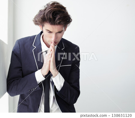 Thinking, mistake and a businessman with a prayer in the office for support, hope and trust. Serious, idea and a young corporate employee with spiritual help for a decision or fail in the workplace Thinking, mistake and a businessman with a prayer in the office for support, hope and trust. Serious, idea and a young corporate employee with spiritual help for a decision or fail in the workplace 138631120