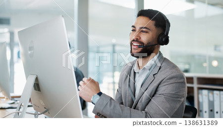 Call center, customer service and man on an online consultation on a computer working in the office. Contact us, crm and young male telemarketing consultant or agent talking for support in workplace. 138631389