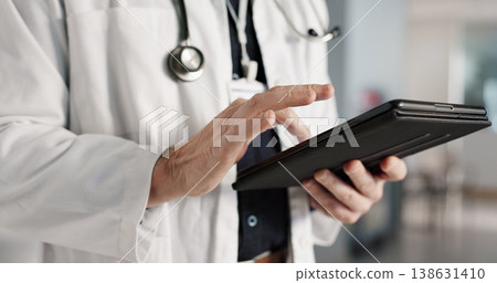Doctor, hands and tablet for healthcare or medical information, online charts and research results in clinic. Health worker or person with x ray analysis on digital technology or hospital software 138631410