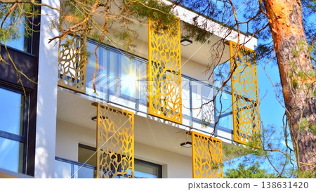 Apartments in residential complex. Housing structure at modern house. Architecture for property investment. and architecture details. Urban abstract - windows of apartment building. Apartments in residential complex. Housing structure at modern house. Architecture for property investment. and architecture details. Urban abstract - windows of apartment building. 138631420