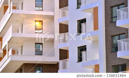 Apartments in residential complex. Housing structure at modern house. Architecture for property investment. and architecture details. Urban abstract - windows of apartment building. Apartments in residential complex. Housing structure at modern house. Architecture for property investment. and architecture details. Urban abstract - windows of apartment building. 138631464