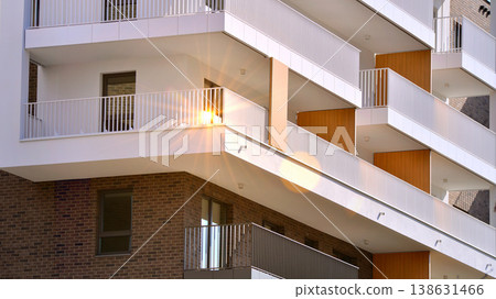 Apartments in residential complex. Housing structure at modern house. Architecture for property investment. and architecture details. Urban abstract - windows of apartment building. Apartments in residential complex. Housing structure at modern house. Architecture for property investment. and architecture details. Urban abstract - windows of apartment building. 138631466