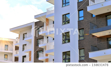 Apartments in residential complex. Housing structure at modern house. Architecture for property investment. and architecture details. Urban abstract - windows of apartment building. Apartments in residential complex. Housing structure at modern house. Architecture for property investment. and architecture details. Urban abstract - windows of apartment building. 138631478
