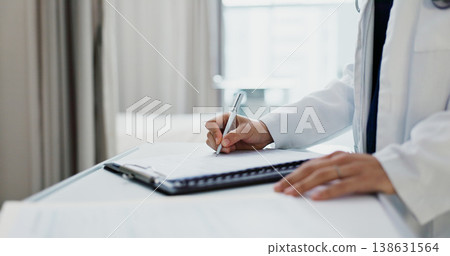 Doctor, hands and writing on checklist at desk for health, information and paperwork. Table, clipboard and closeup of medical woman on chart for prescription, notes or insurance document in hospital 138631564
