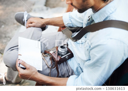 Man, photographer and camera with map outdoor for travel, direction or location for explore in nature. Person, photography or paper on bench for adventure, journey or tourist with exploration or trip Man, photographer and camera with map outdoor for travel, direction or location for explore in nature. Person, photography or paper on bench for adventure, journey or tourist with exploration or trip 138631613