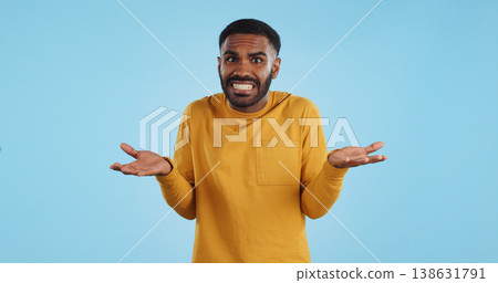 Confused, hands and face of man in studio with dont know, gesture or ask on blue background. Why, portrait and guy model with oops, mistake or doubt, unsure or forget, guess or palm scale questions Confused, hands and face of man in studio with dont know, gesture or ask on blue background. Why, portrait and guy model with oops, mistake or doubt, unsure or forget, guess or palm scale questions 138631791