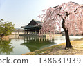 Gyeonghoeru Pavilion in Gyeongbokgung Palace with blooming pink weeping cherry blossoms 138631939
