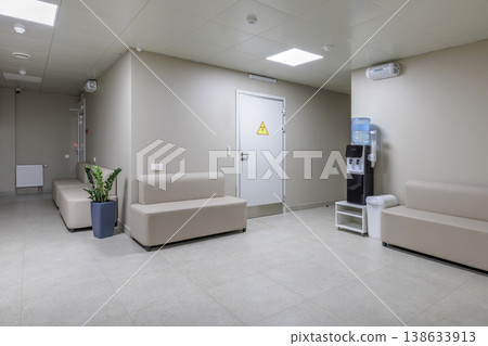 Clinic Waiting Area with Water Cooler and Modern Interior Clinic Waiting Area with Water Cooler and Modern Interior 138633913