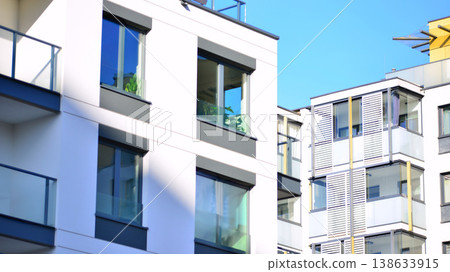 Apartments in residential complex. Housing structure at modern house. Architecture for property investment. and architecture details. Urban abstract - windows of apartment building. Apartments in residential complex. Housing structure at modern house. Architecture for property investment. and architecture details. Urban abstract - windows of apartment building. 138633915