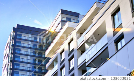 Apartments in residential complex. Housing structure at modern house. Architecture for property investment. and architecture details. Urban abstract - windows of apartment building. Apartments in residential complex. Housing structure at modern house. Architecture for property investment. and architecture details. Urban abstract - windows of apartment building. 138633921