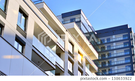 Apartments in residential complex. Housing structure at modern house. Architecture for property investment. and architecture details. Urban abstract - windows of apartment building. Apartments in residential complex. Housing structure at modern house. Architecture for property investment. and architecture details. Urban abstract - windows of apartment building. 138633922