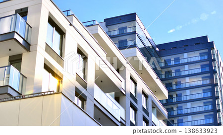 Apartments in residential complex. Housing structure at modern house. Architecture for property investment. and architecture details. Urban abstract - windows of apartment building. Apartments in residential complex. Housing structure at modern house. Architecture for property investment. and architecture details. Urban abstract - windows of apartment building. 138633923